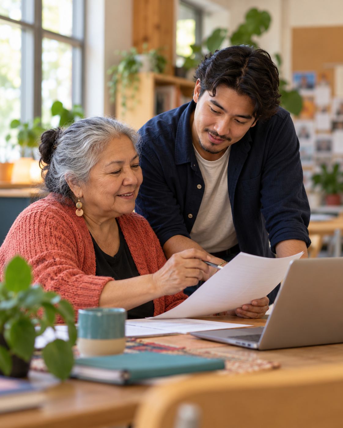 Two charity coworkers reviewing plans together
